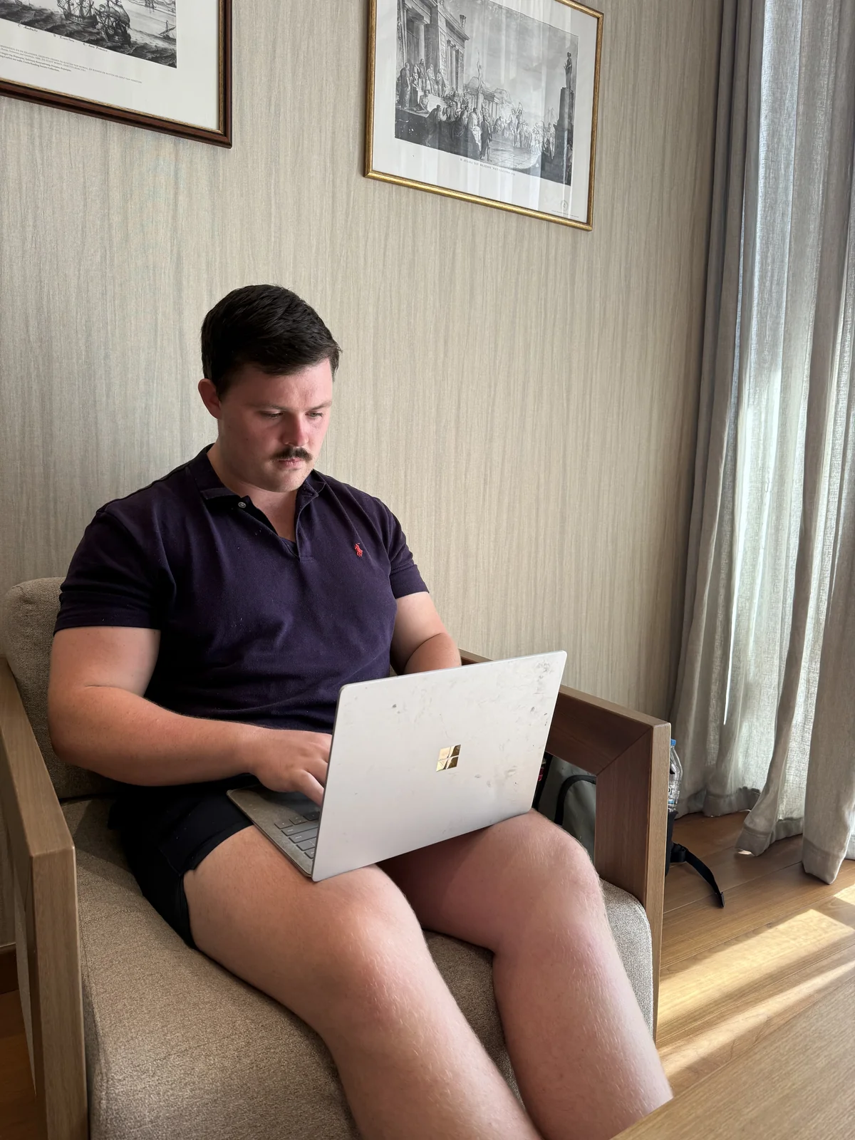 Charlie Johns working remotely while travelling